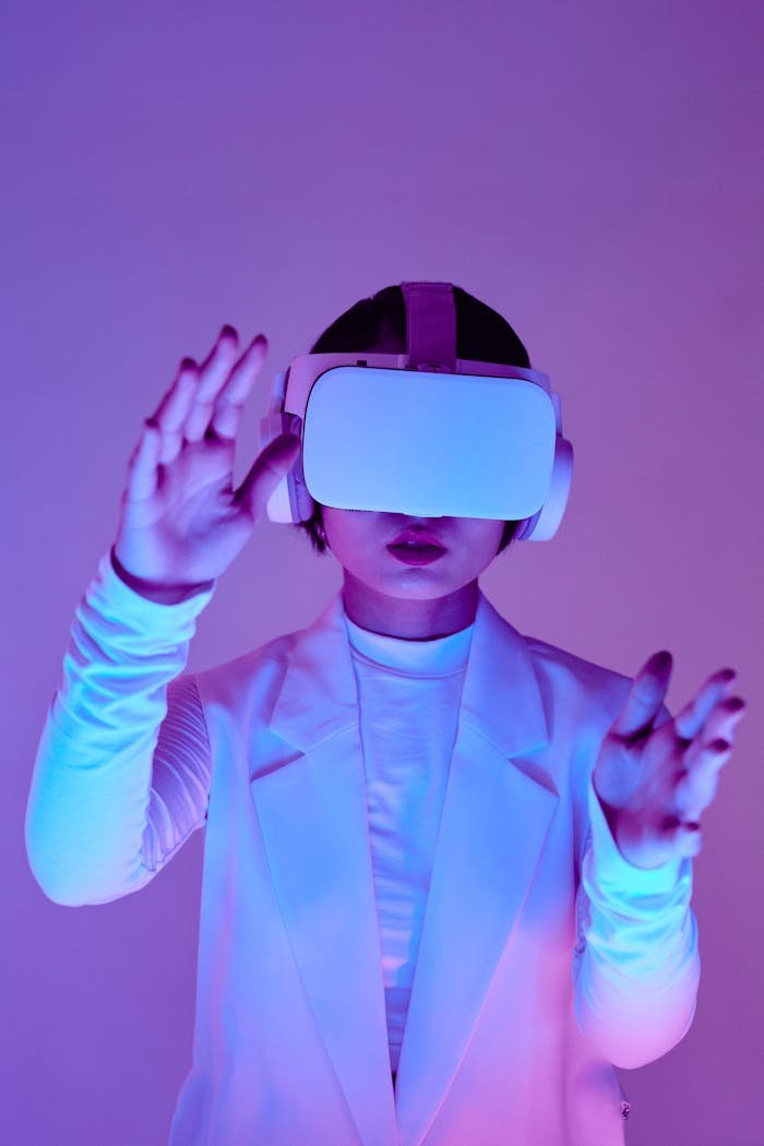 Woman in virtual reality headset interacting in a vibrant conceptual studio shoot.